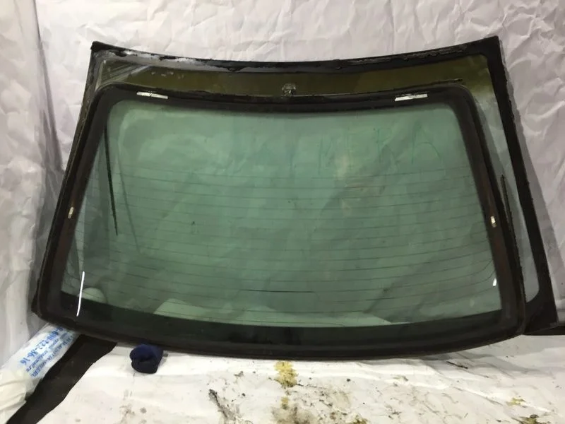 Стекло заднее Nissan Almera N16 (2000—2003)