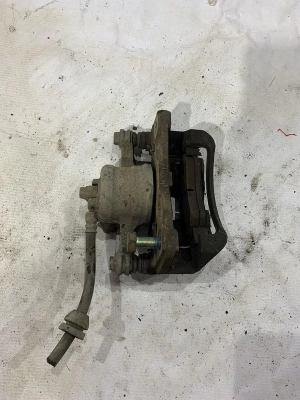 Суппорт тормозной передний левый Chevrolet Aveo II (2011—2020)