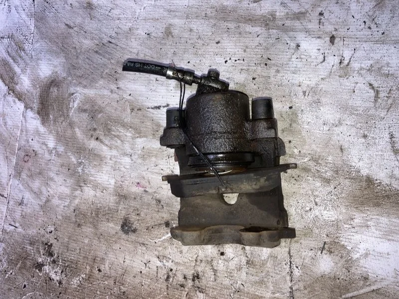 Суппорт тормозной передний левый Skoda Octavia I (1996—2000)