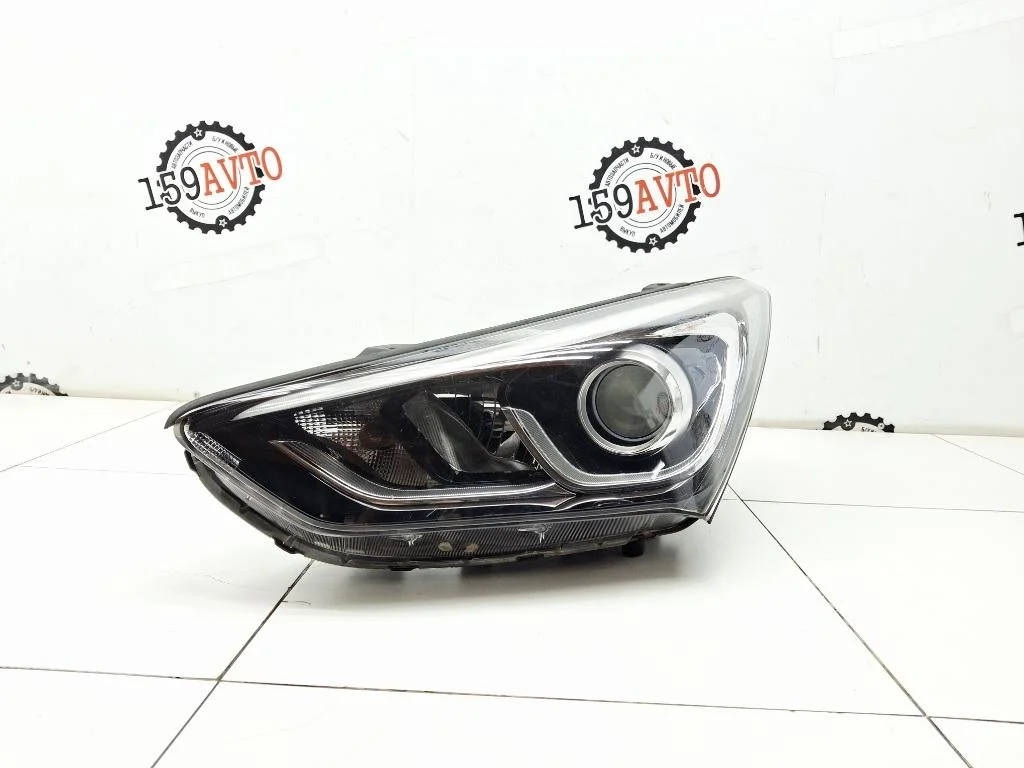 Фара левая Hyundai Santa Fe 3 921012W601 DM