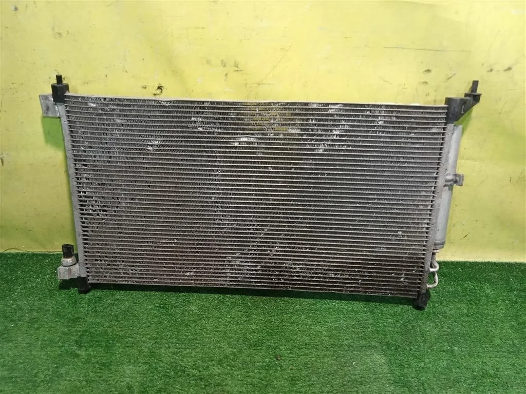 Радиатор кондиционера Nissan Tiida C11 2007 92100ZW40A 17936