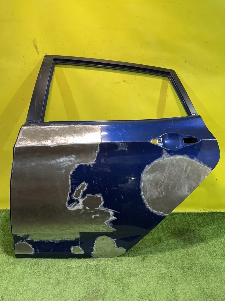 Дверь задняя левая  Hyundai Solaris 2010 770034L200 39931