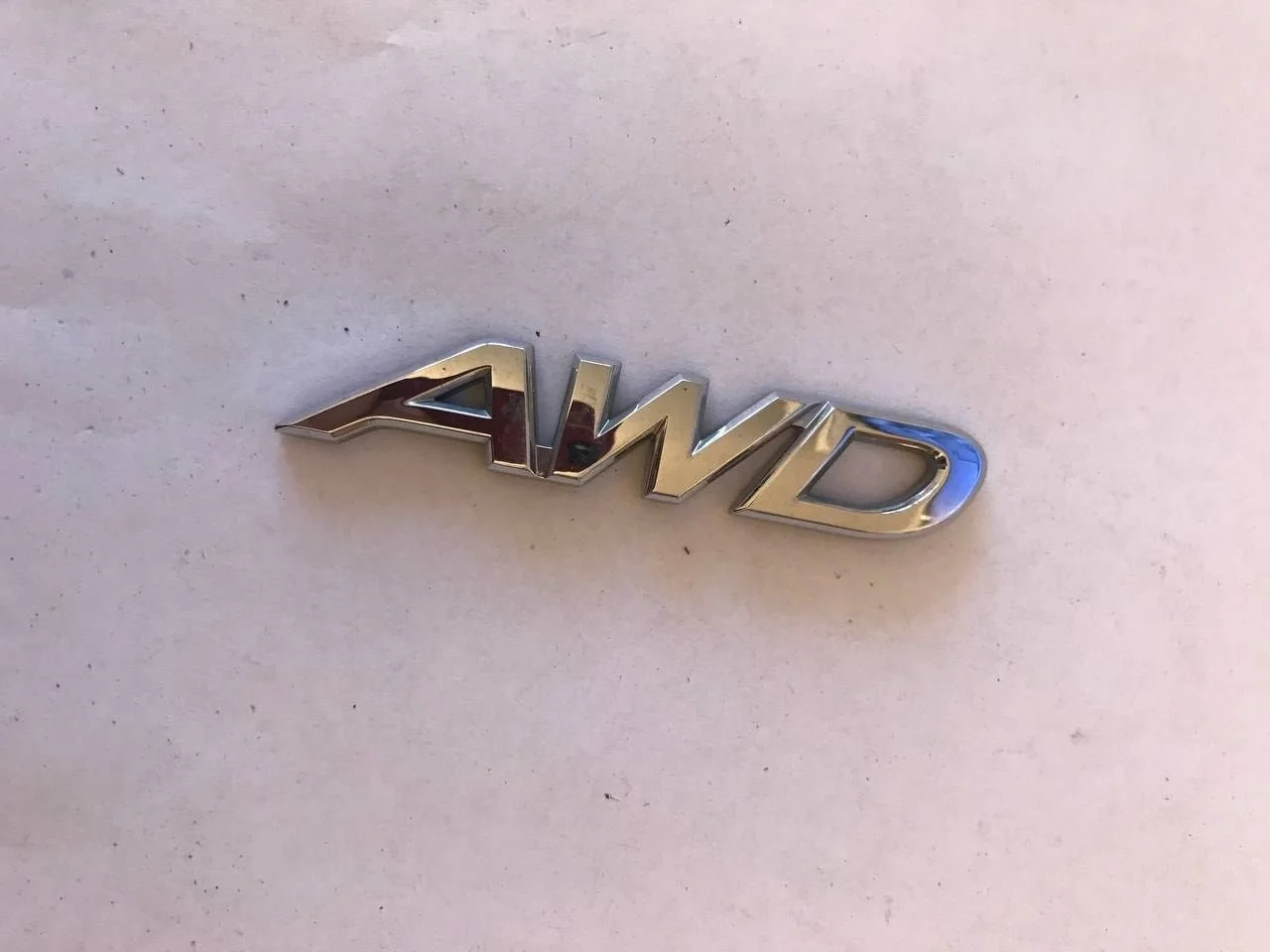 Эмблема багажника Mazda CX 5 KD4751781, задняя