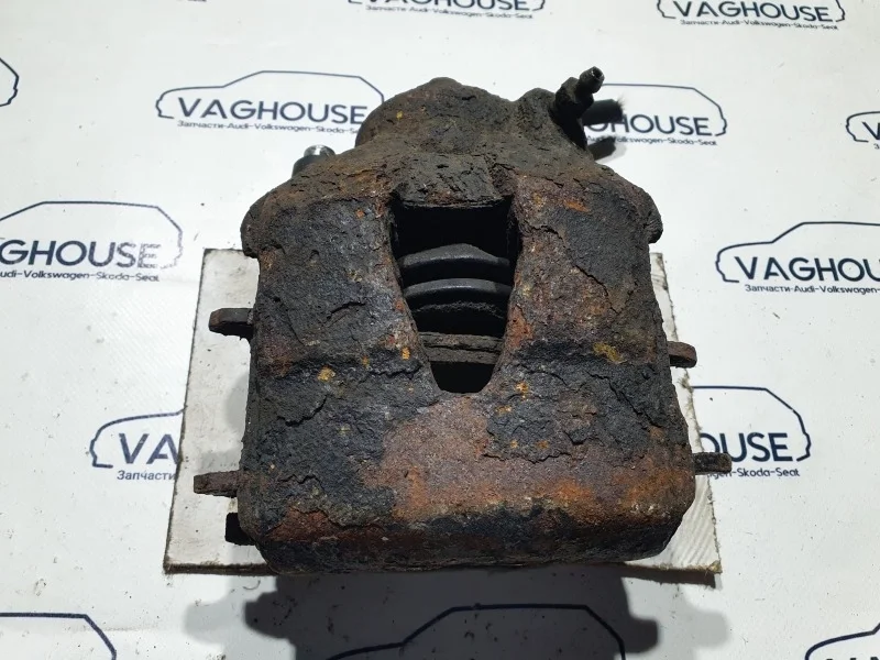 Суппорт передний левый Volkswagen Golf MK4 AKL