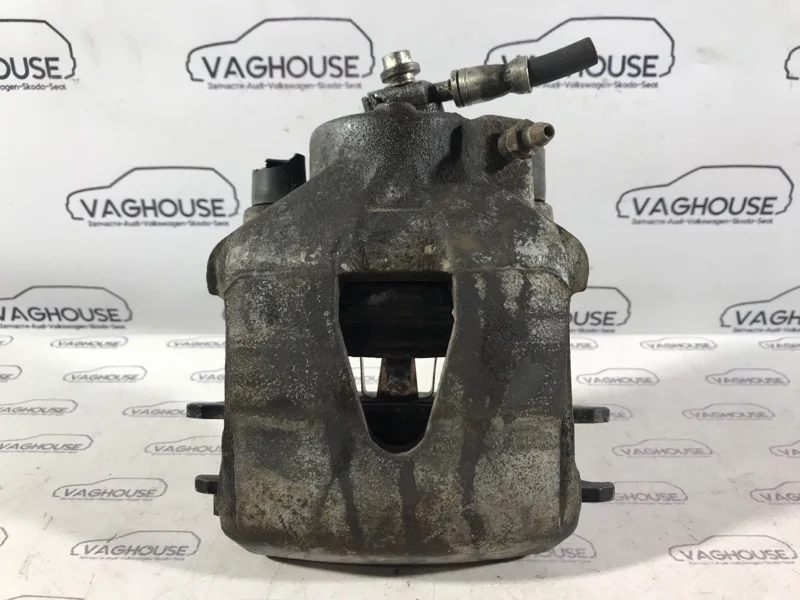 Суппорт передний левый Volkswagen Golf MK4 1.6 AKL