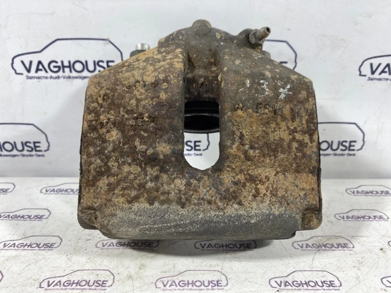 Суппорт передний левый Volkswagen Passat B6 3С 2.0