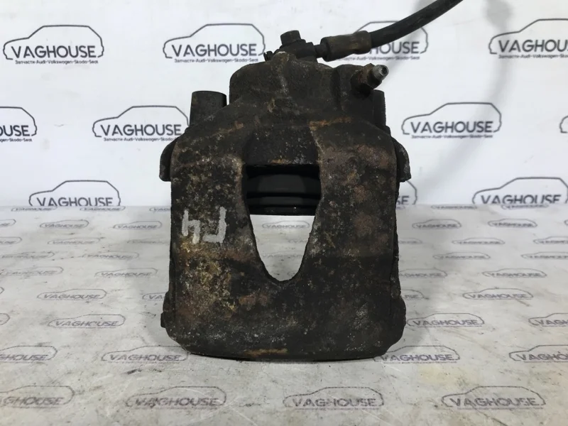 Суппорт передний левый Volkswagen Polo SEDAN 1.6