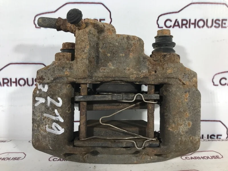 Суппорт задний левый Mitsubishi Pajero Sport 3.0