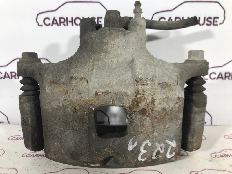 Суппорт передний левый Mitsubishi Lancer X 2.0