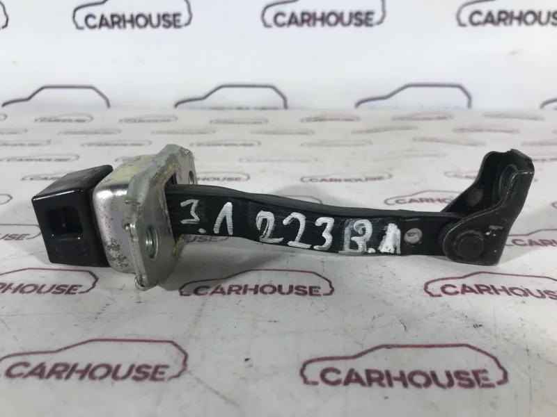 Ограничитель двери задний левый Mitsubishi Lancer