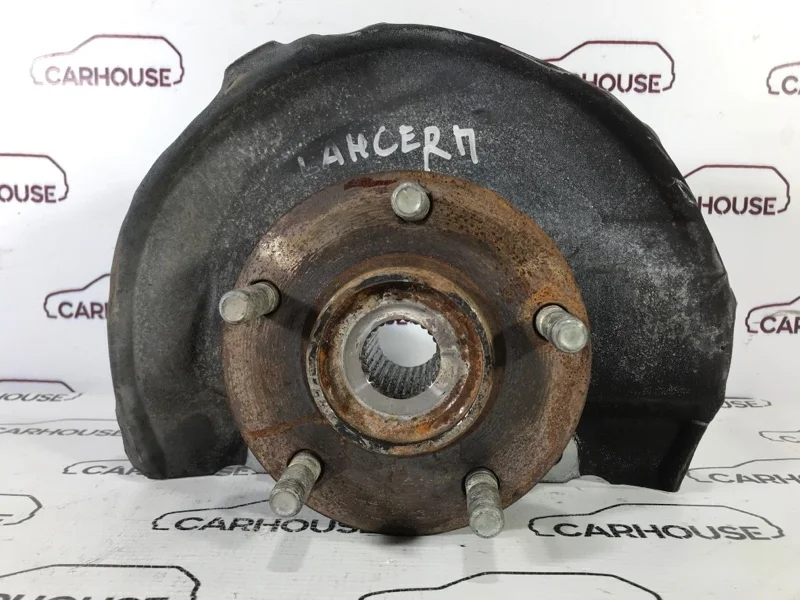 Кулак поворотный передний левый Mitsubishi Lancer