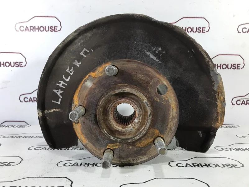 Кулак поворотный передний левый Mitsubishi Lancer