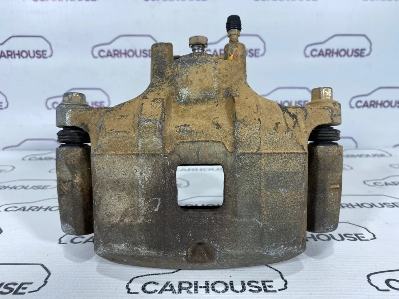 Суппорт передний левый Mitsubishi Lancer 9 1.6