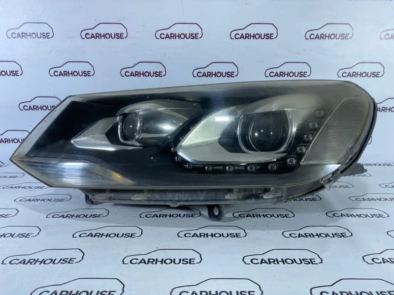 Фара левая Volkswagen Touareg NF 2014