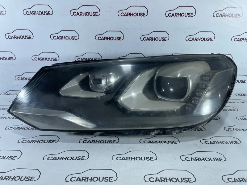 Фара левая Volkswagen Touareg NF 2010