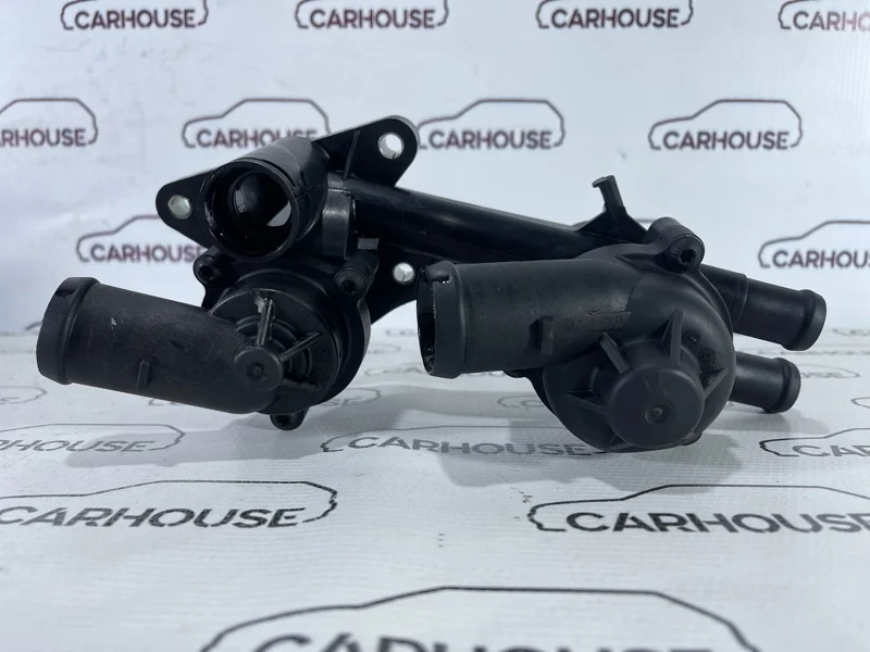 Корпус термостата Volkswagen Passat B6 1.4 CAXA