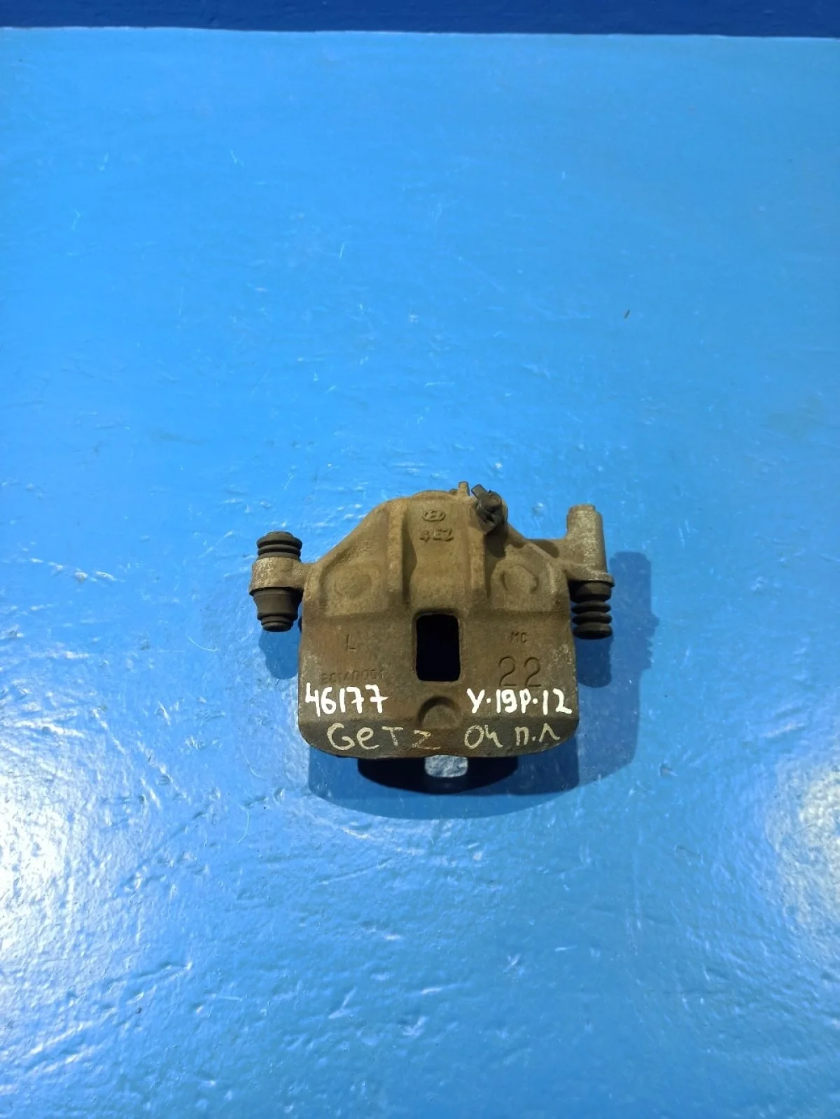 Суппорт тормозной передний левый Hyundai Getz