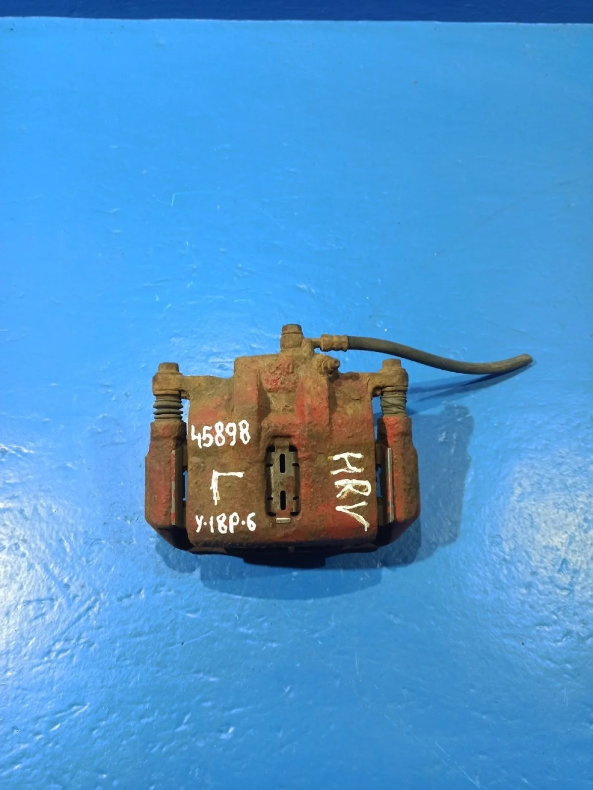 Суппорт тормозной передний левый Honda HR-V