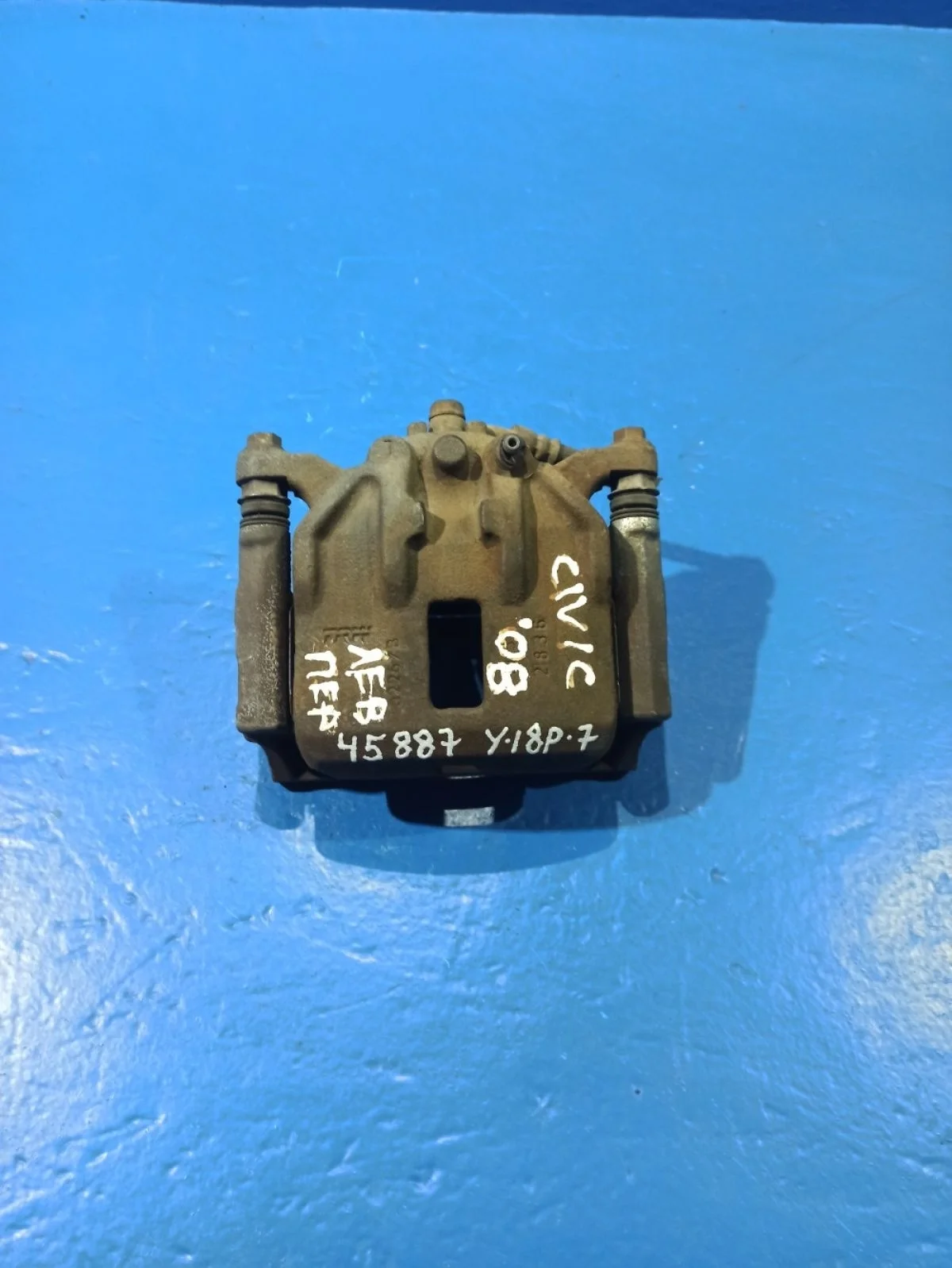 Суппорт тормозной передний левый Honda Civic 5D