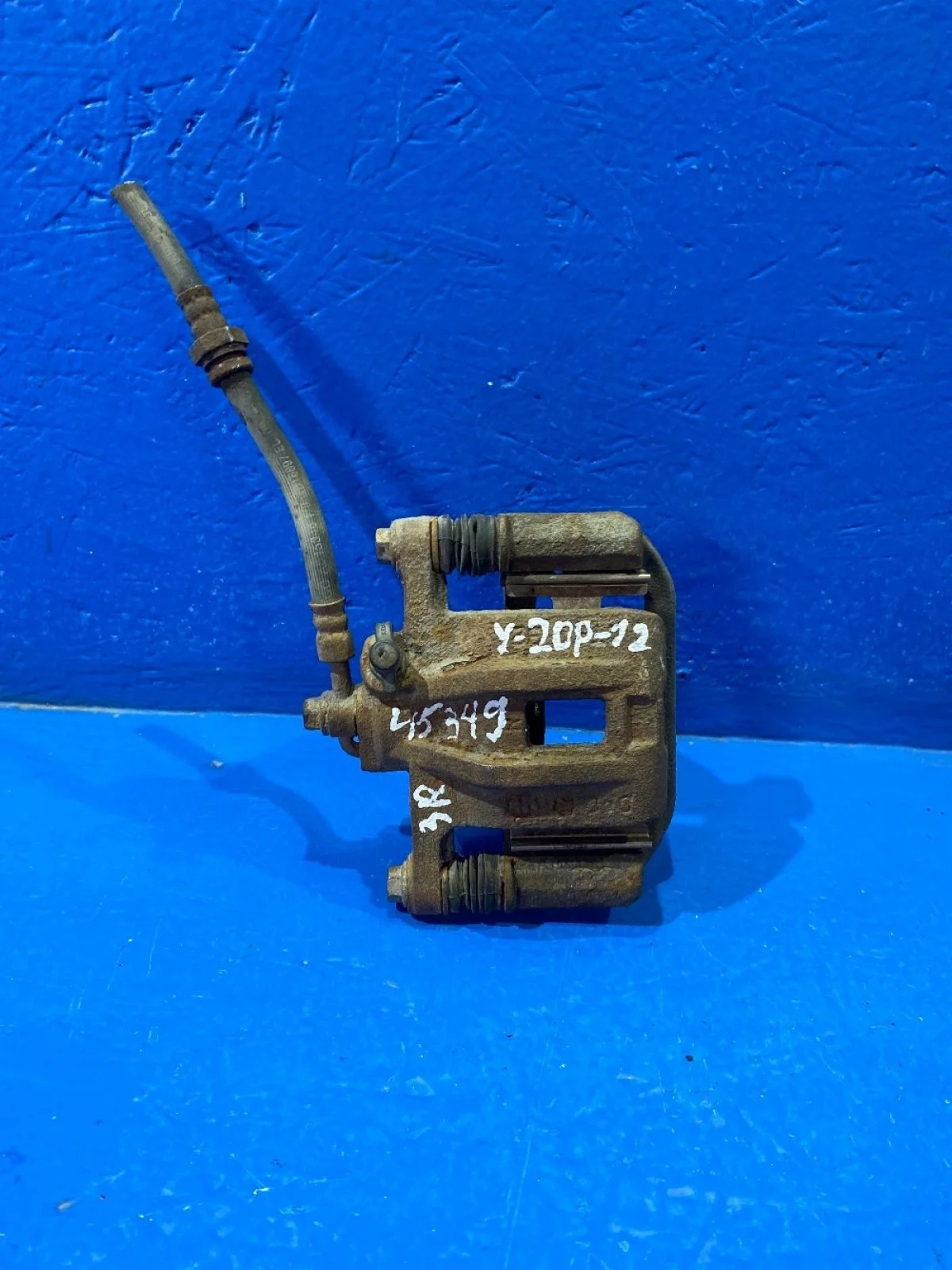 Суппорт тормозной задний правый Chevrolet Lacetti I (2004—2013)