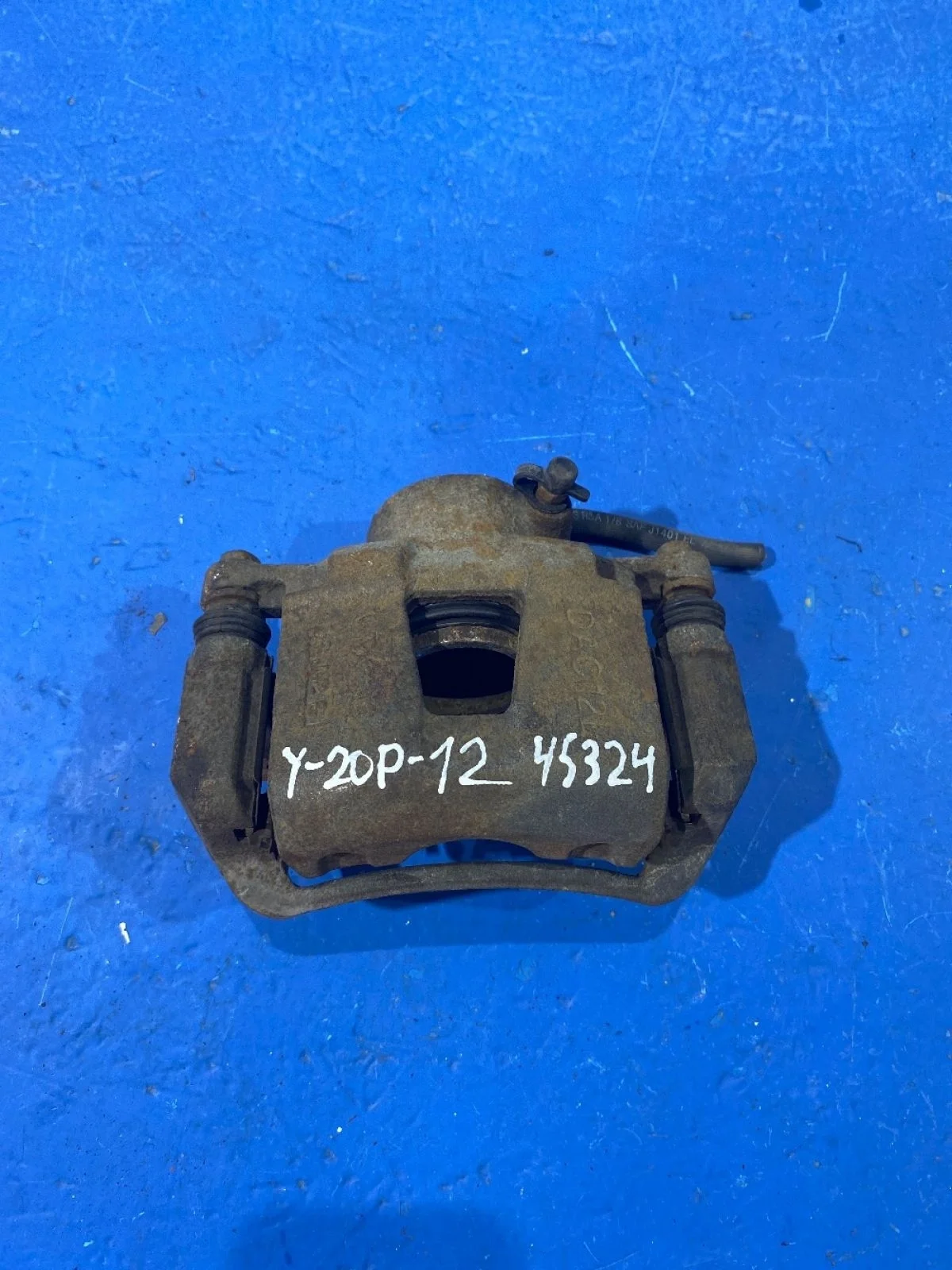 Суппорт тормозной передний левый Chevrolet Lacetti I (2004—2013)