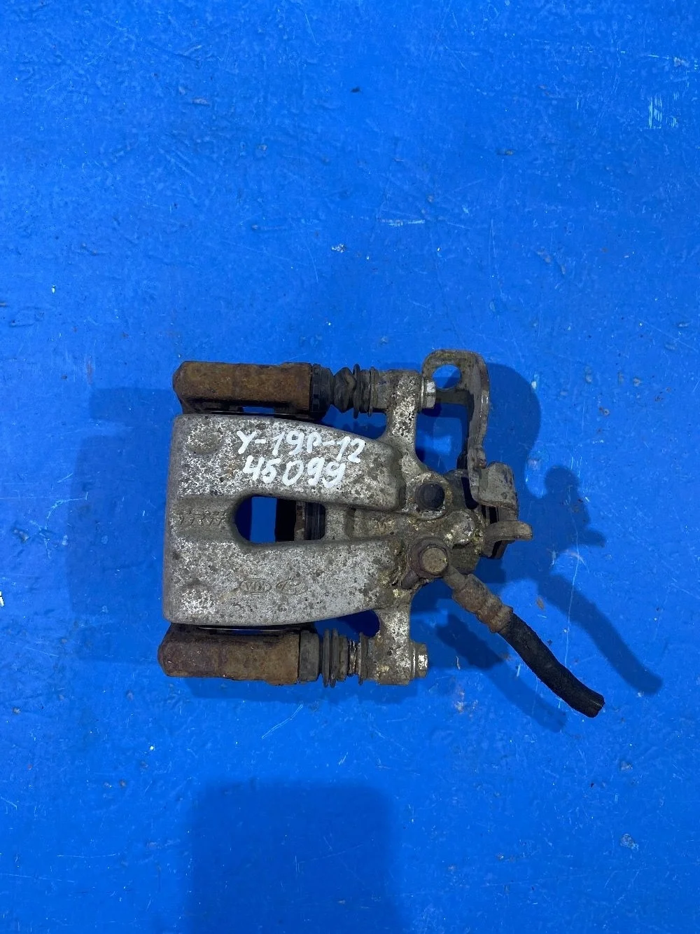 Суппорт тормозной задний левый Kia Ceed JD (2012—2015)