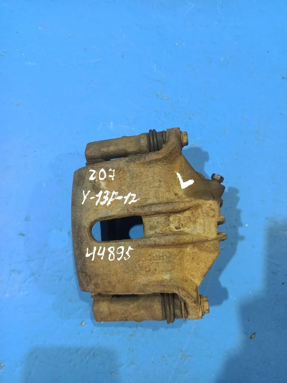 Суппорт тормозной передний левый Peugeot 207 I (2006—2009)