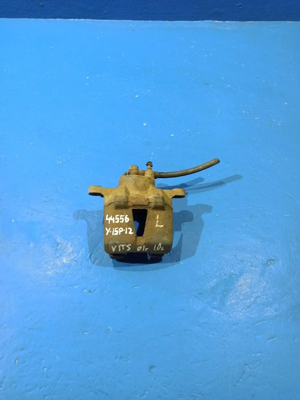 Суппорт тормозной передний левый Toyota Yaris I (1999—2003)