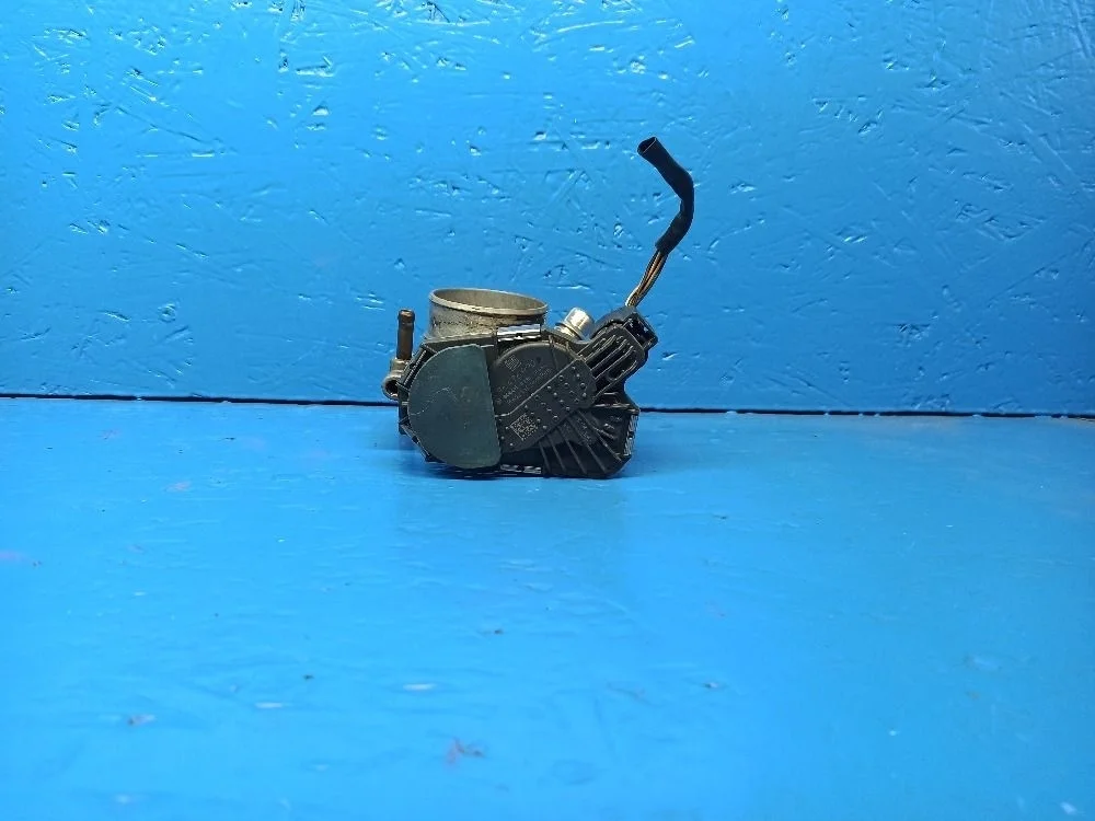 Заслонка дроссельная  Chevrolet Aveo T250 1.4