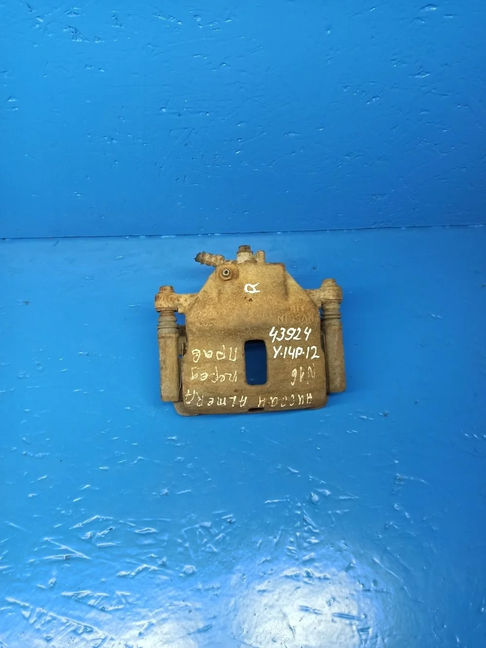 Суппорт тормозной передний правый Nissan Almera N16 рестайлинг (2002—2006)