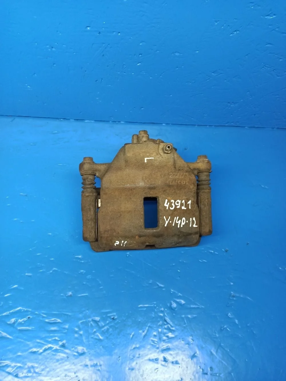 Суппорт тормозной передний левый Nissan Almera N16 рестайлинг (2002—2006)