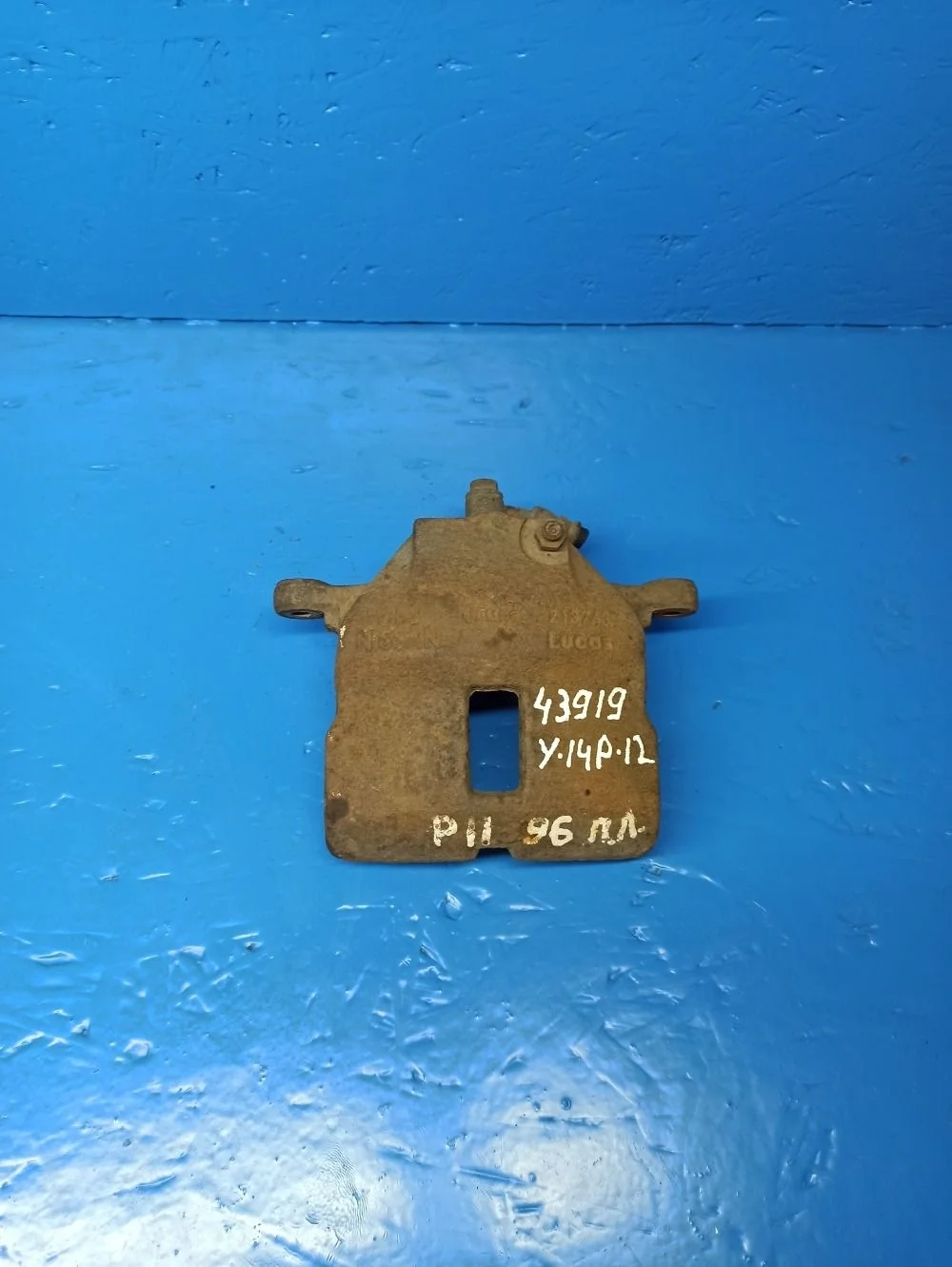 Суппорт тормозной передний левый Nissan Almera N16 рестайлинг (2002—2006)