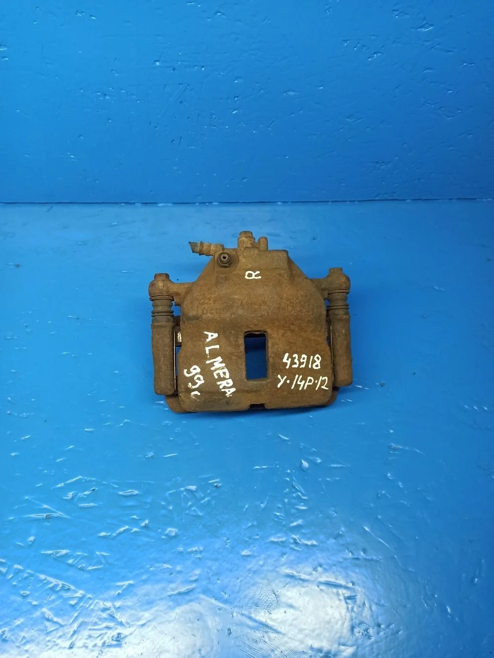 Суппорт тормозной передний правый Nissan Almera N16 рестайлинг (2002—2006)