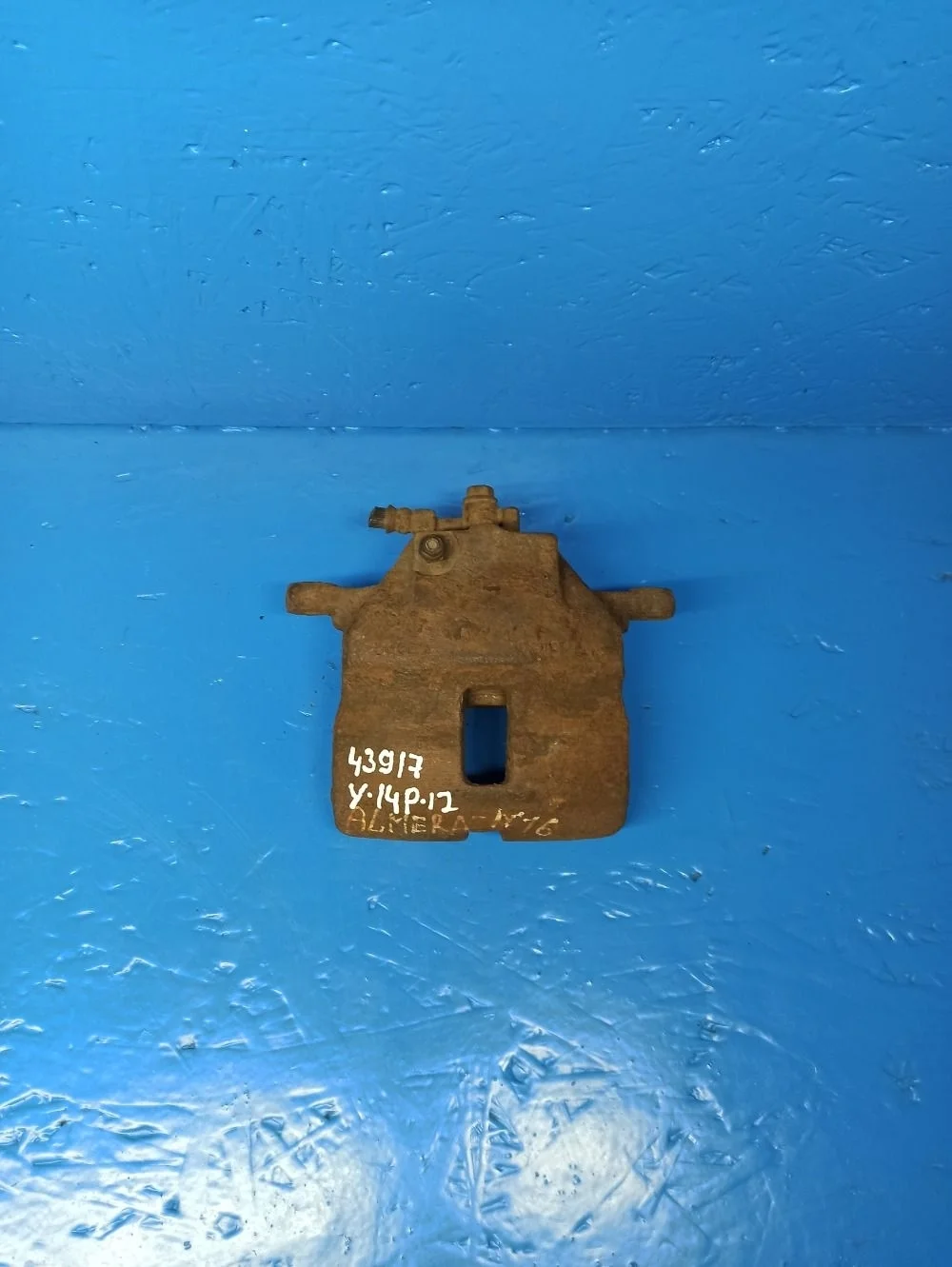 Суппорт тормозной передний правый Nissan Almera N16 рестайлинг (2002—2006)