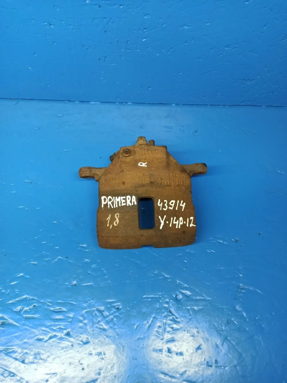 Суппорт тормозной передний правый Nissan Almera N16 рестайлинг (2002—2006)