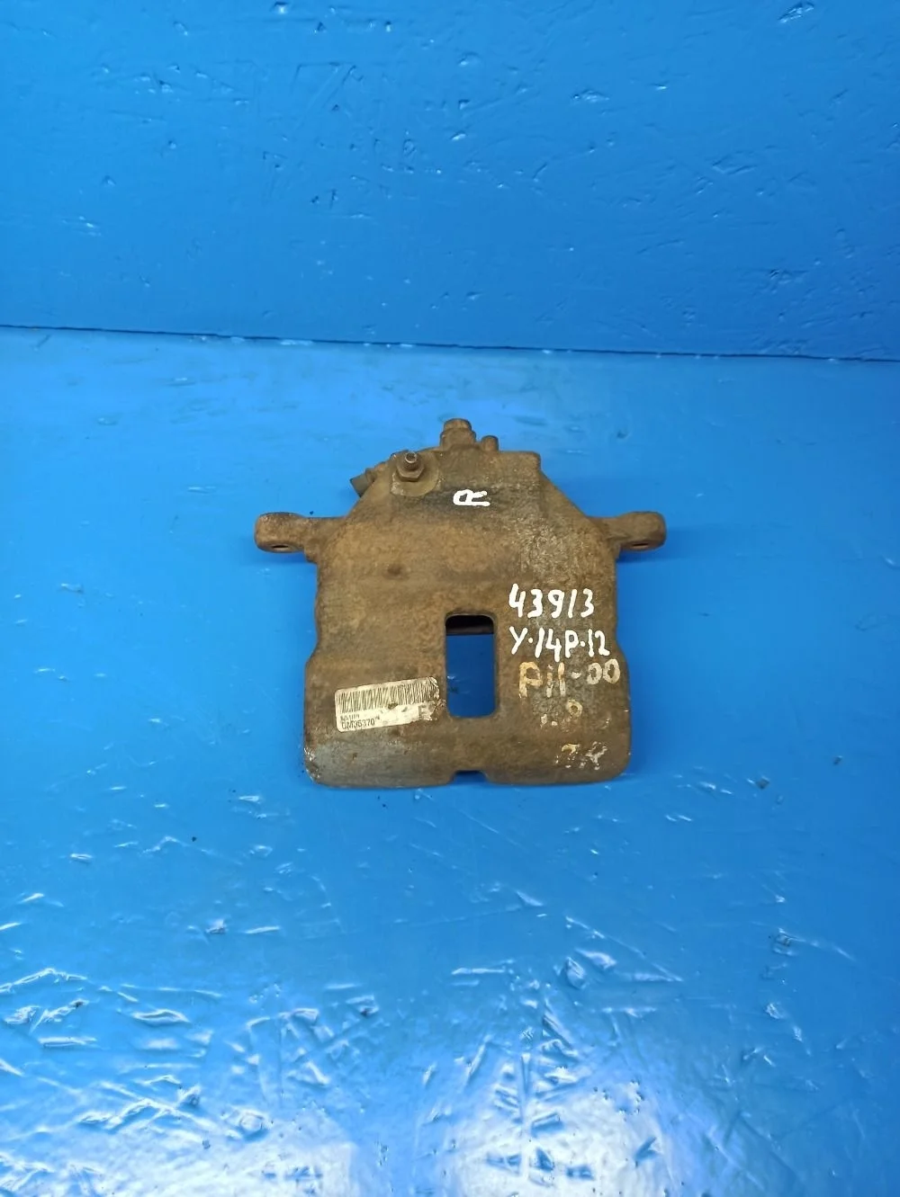 Суппорт тормозной передний правый Nissan Almera N16 рестайлинг (2002—2006)