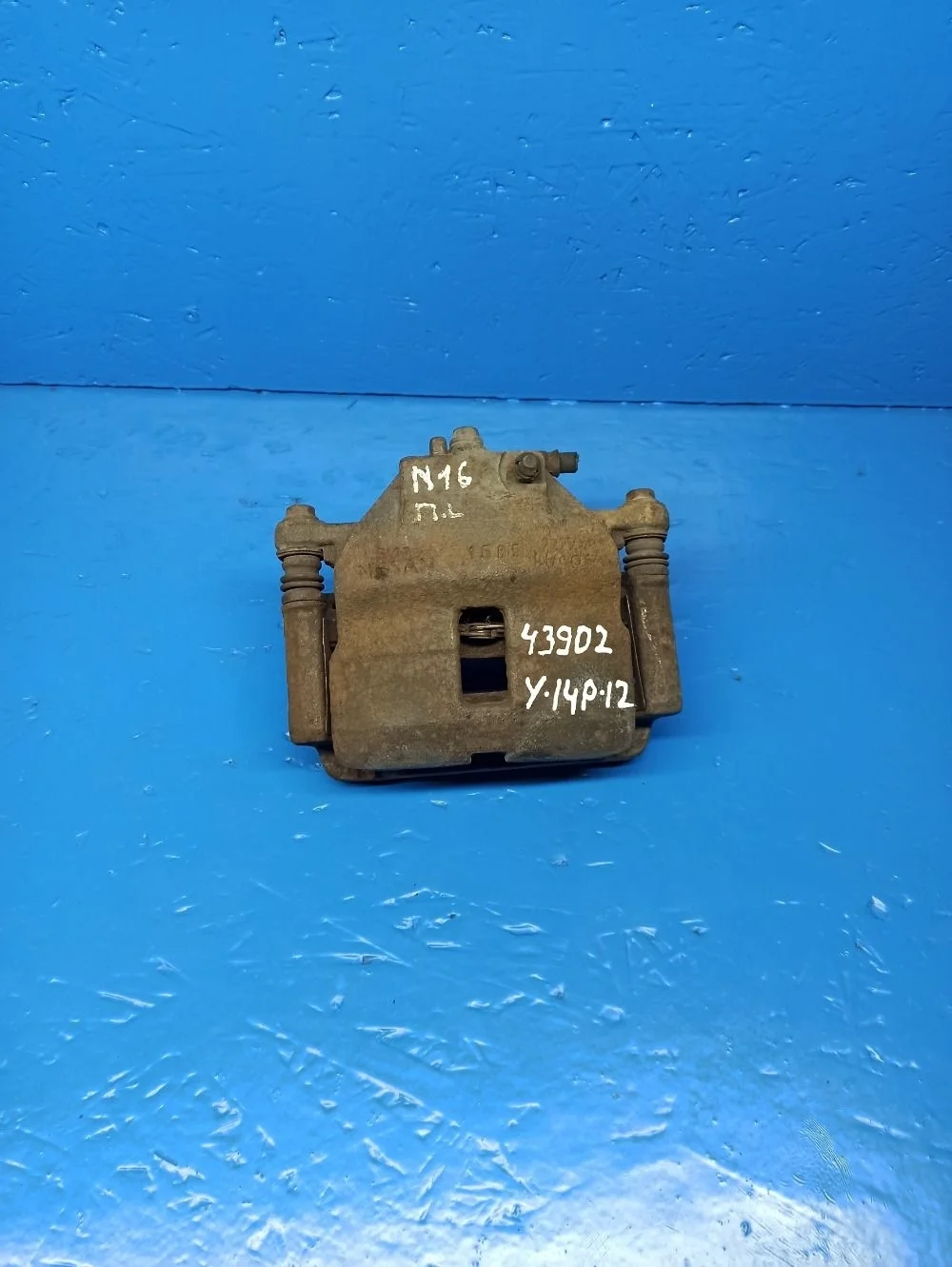 Суппорт тормозной передний левый Nissan Almera N16 рестайлинг (2002—2006)