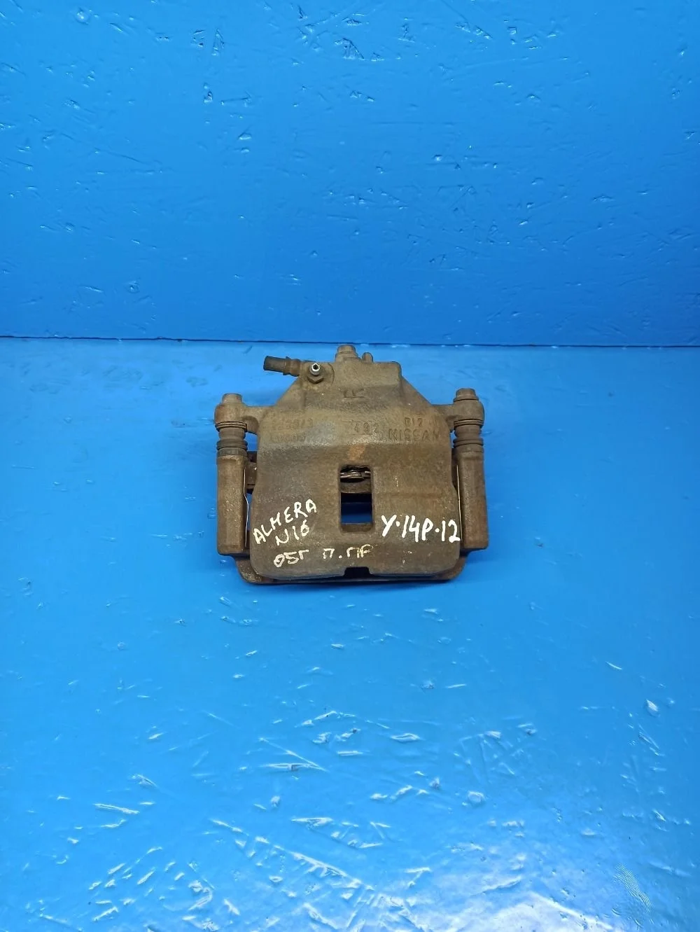 Суппорт тормозной передний правый Nissan Almera N16 рестайлинг (2002—2006)