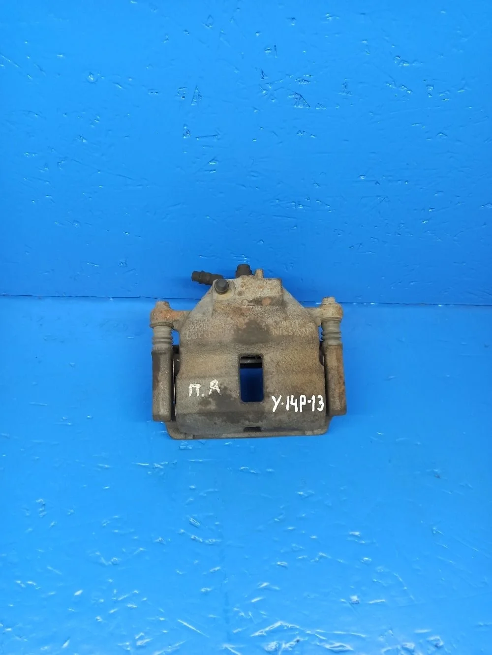 Суппорт тормозной передний правый Nissan Almera N16 рестайлинг (2002—2006)