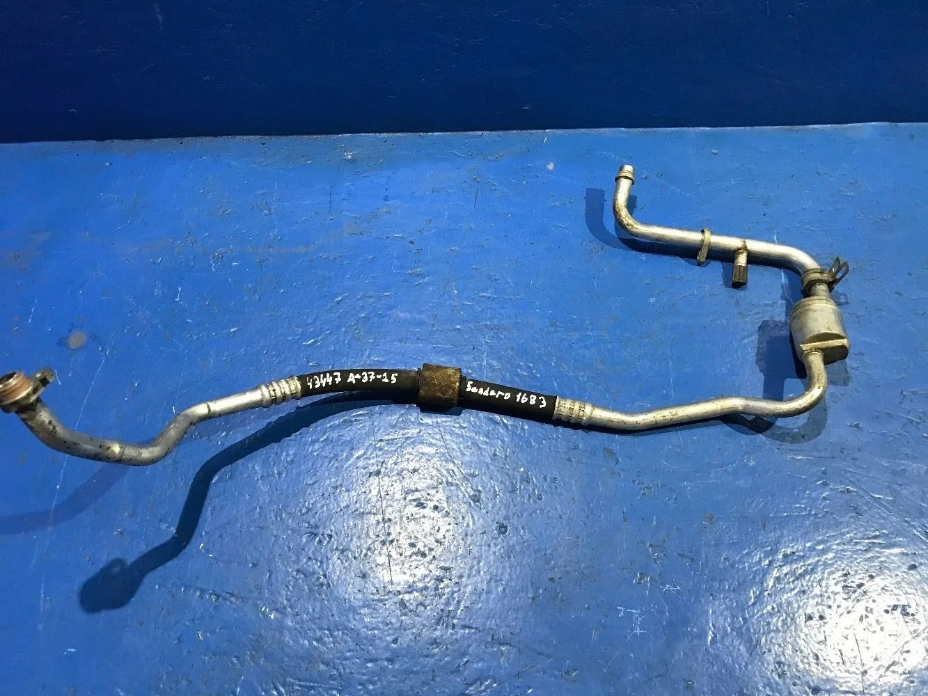 Трубка, шланг кондиционера Sandero 1, Logan 1