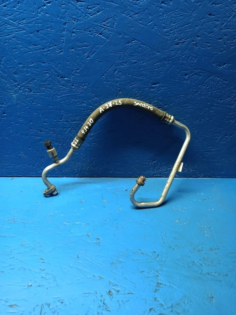 Трубка кондиционера Рено Логан Сандеро 1 Ларгус