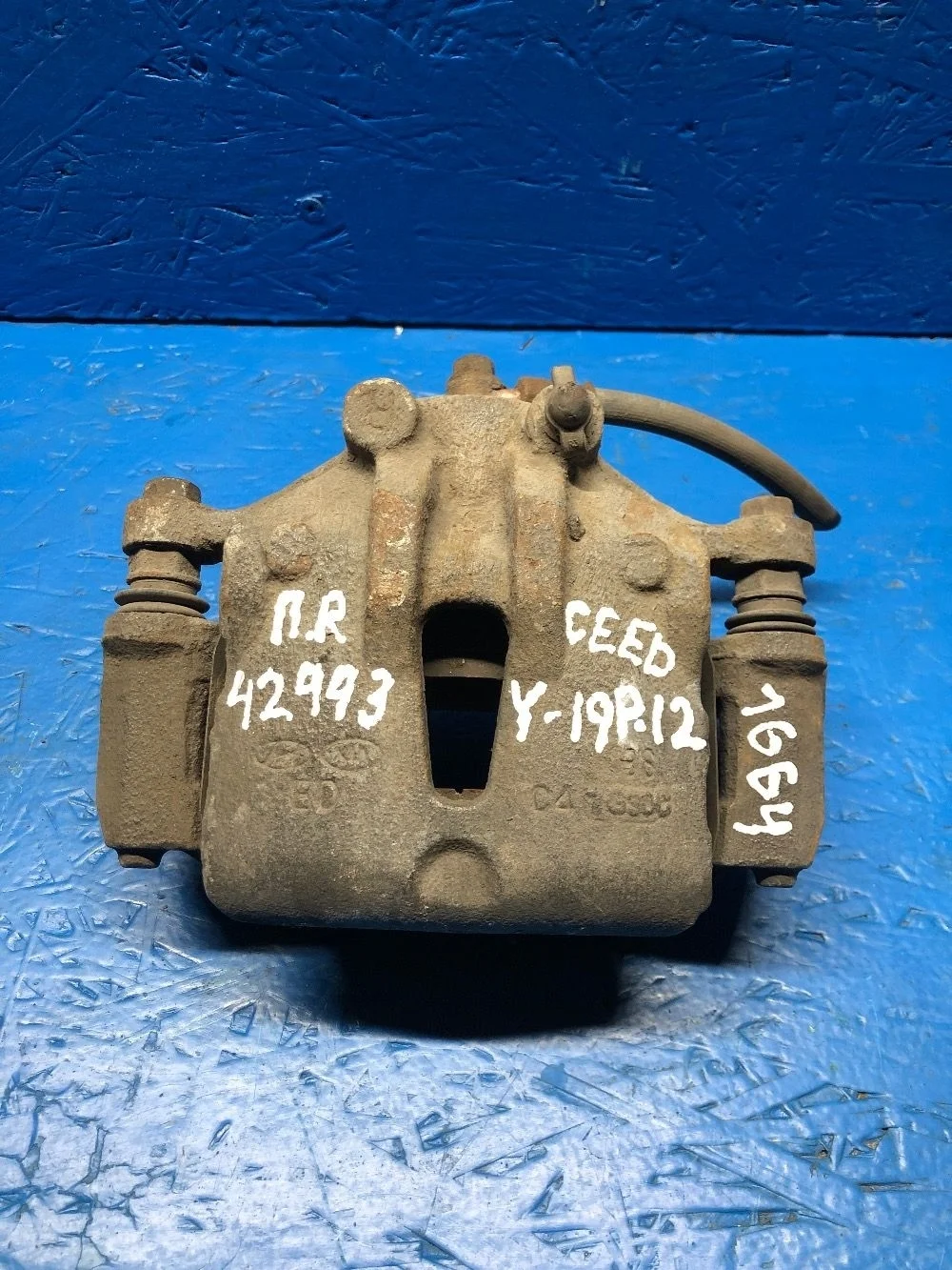 Суппорт тормозн передн лев Hyundai-KIA 581301H000