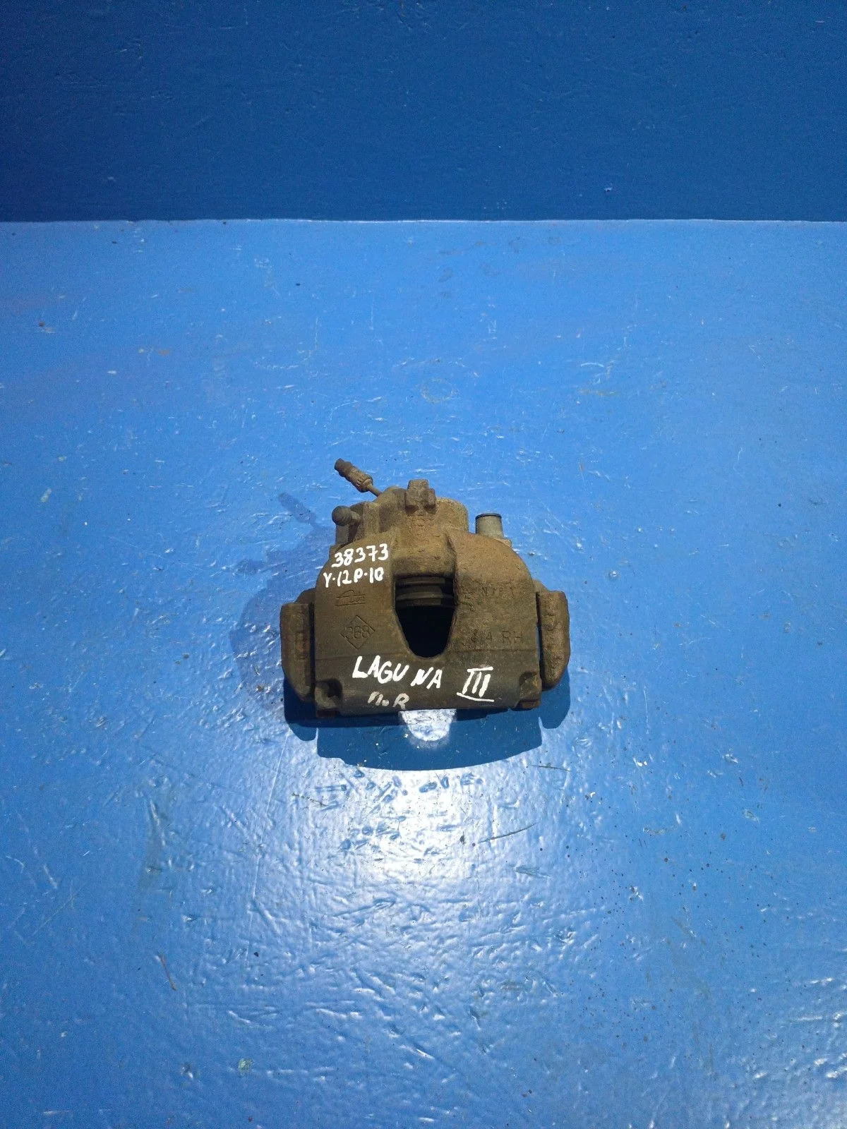 Суппорт тормозной передний правый Renault Laguna III (2007—2012)