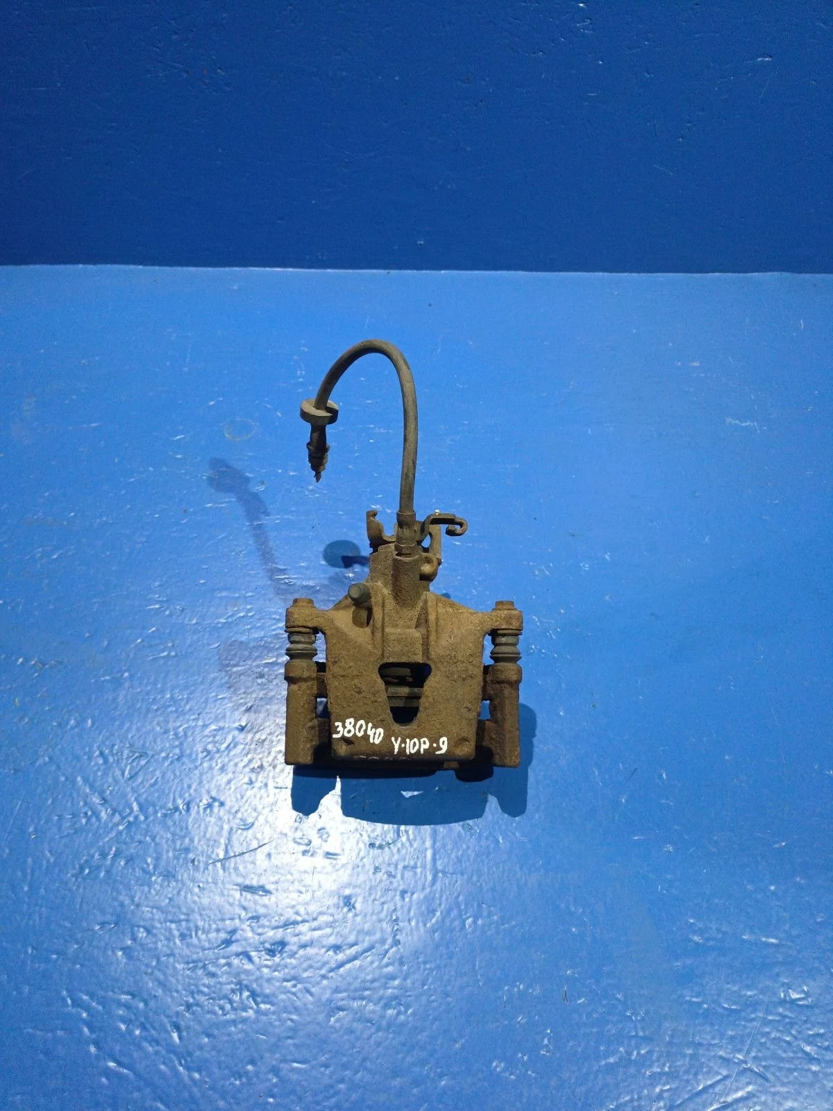 Суппорт тормозной задний левый Ford Mondeo III (2000—2003)