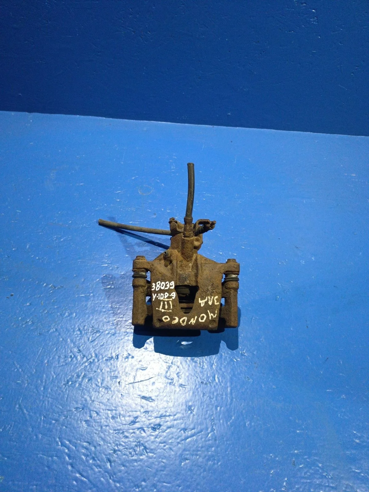 Суппорт тормозной задний левый Ford Mondeo III (2000—2003)