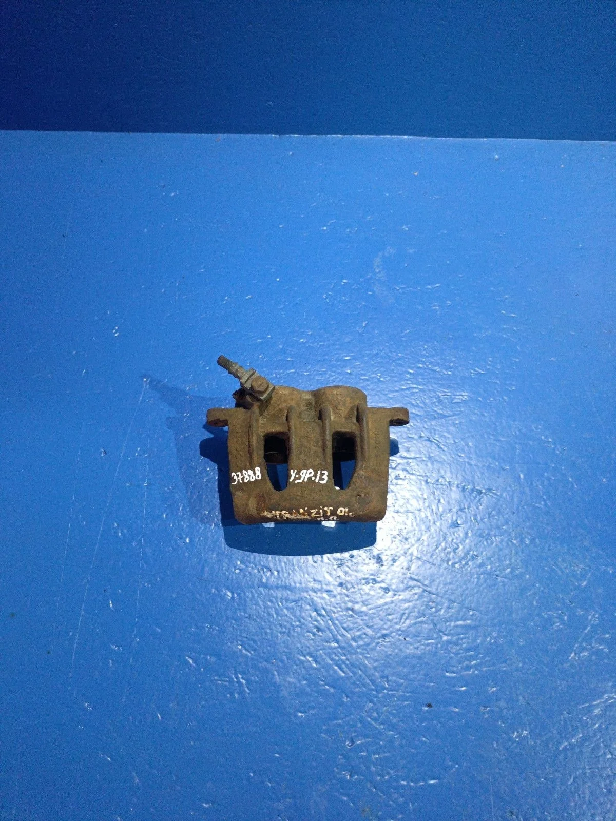 Суппорт тормозной передний левый Ford Transit VI (2000—2006)