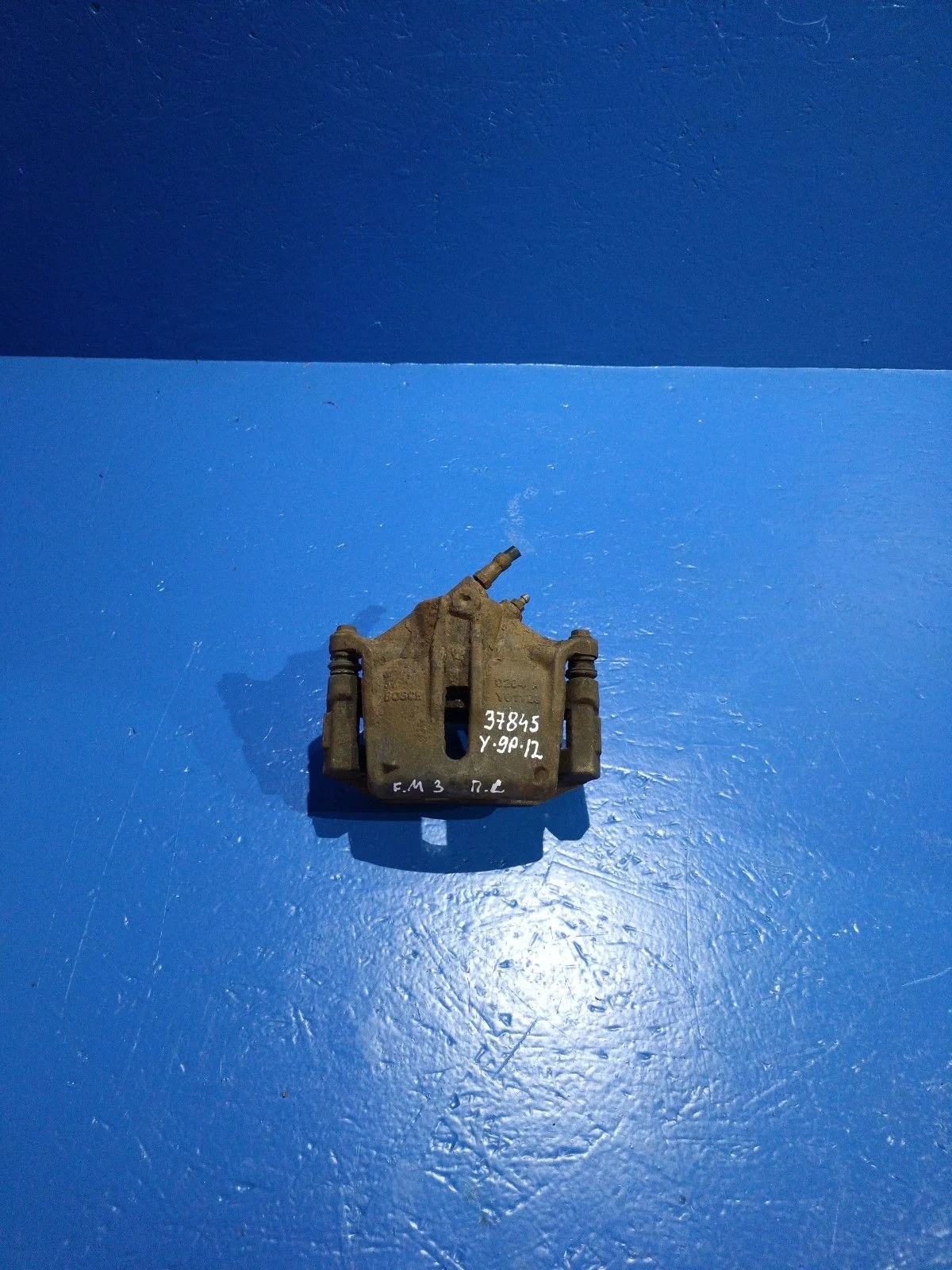 Суппорт тормозной передний левый Ford Mondeo III (2000—2003)