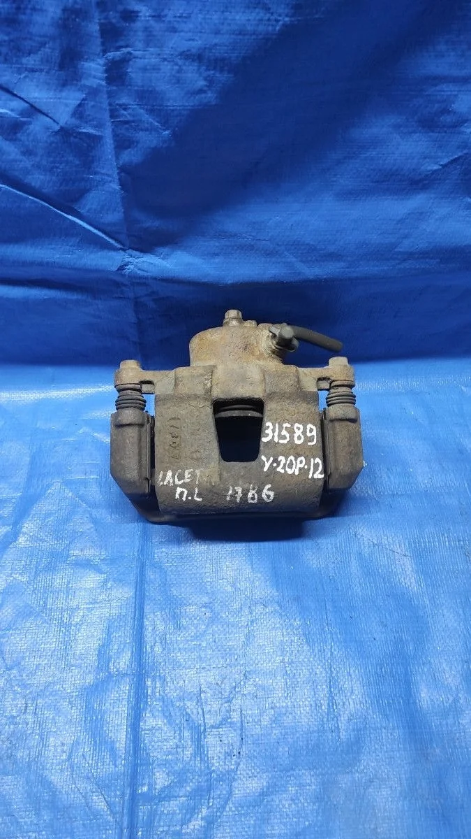 Суппорт тормозной передний левый Chevrolet Lacetti I (2004—2013)