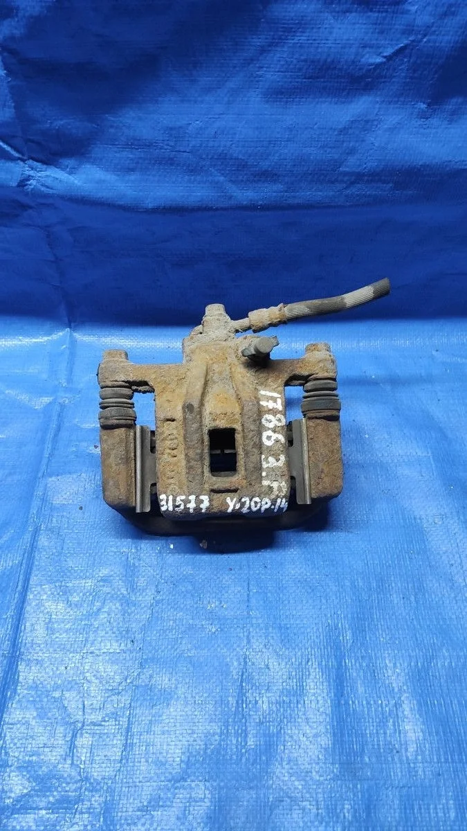 Суппорт тормозной задний правый Chevrolet Lacetti I (2004—2013)