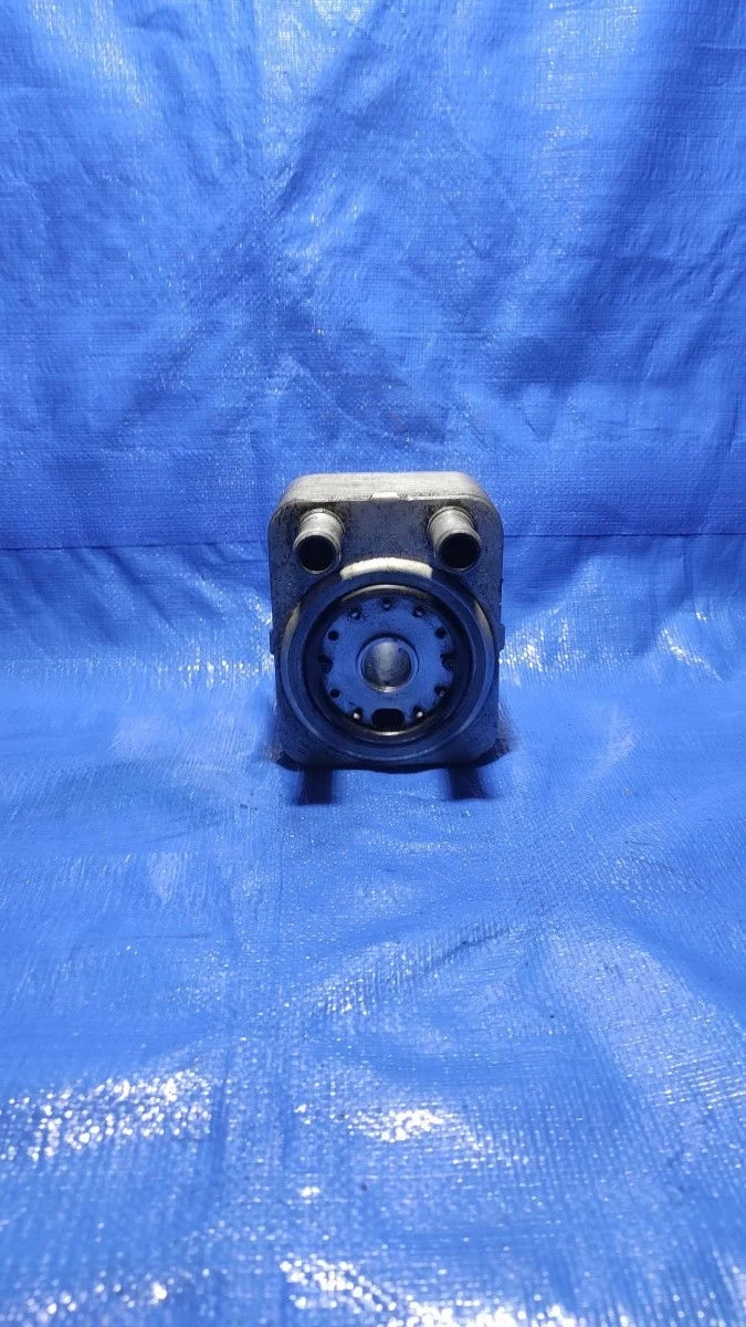 Теплообменник масляного фильтра Audi A6 C6 (2004—2008)